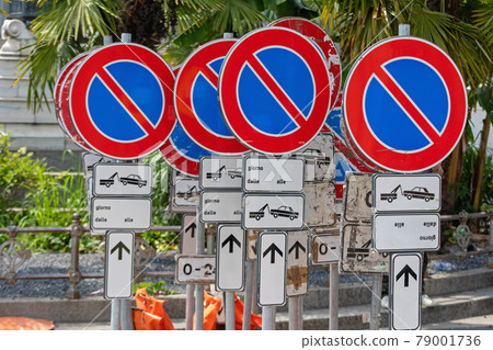 Many No Parking Signs 79001736