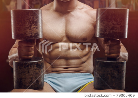 old fashion bodybuilder arm exercises in gym old fashion bodybuilder arm exercises in gym 79003409