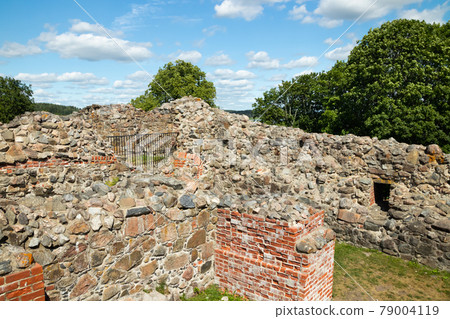 Kuusisto castle ruins at sunny summer day in Kaarina, Finland. Kuusisto castle ruins at sunny summer day in Kaarina, Finland. 79004119