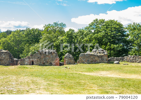 Kuusisto castle ruins at sunny summer day in Kaarina, Finland. Kuusisto castle ruins at sunny summer day in Kaarina, Finland. 79004120