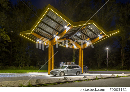 Electric cars charging Electric cars charging 79005181