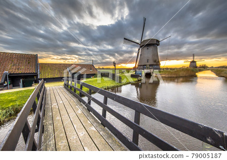 Bridge to Traditional wooden windmill Bridge to Traditional wooden windmill 79005187