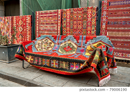 Street counter of traditional carpets on the street in Tbilisi Street counter of traditional carpets on the street in Tbilisi 79006190