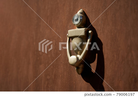 Unusual stylish door knocker in the shape of a robot Unusual stylish door knocker in the shape of a robot 79006197