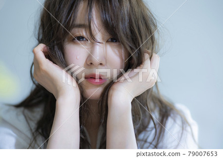 Crying woman tears 79007653