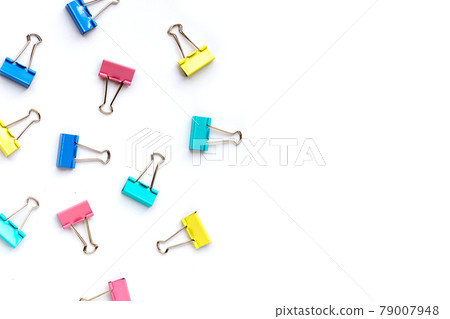 Colorful office paper clips on white background. Colorful office paper clips on white background. 79007948