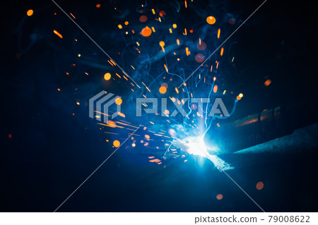 artistic welding sparks light, industrial background 79008622
