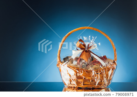 gift basket on blue background 79008971