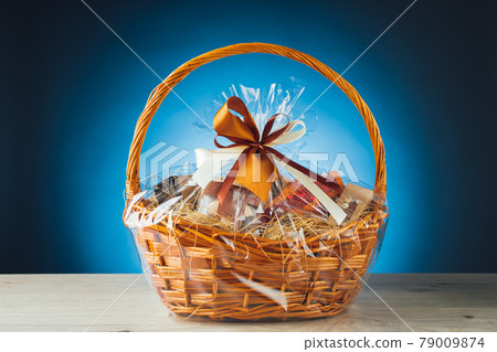 gift basket on blue background 79009874