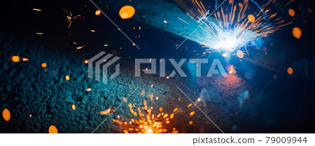 abstract welding sparks light, industrial background 79009944