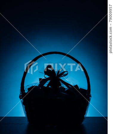 gift basket silhouette on blue background gift basket silhouette on blue background 79009957