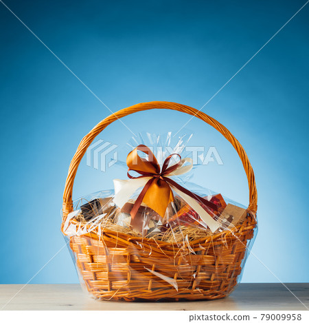 gift basket on blue background 79009958