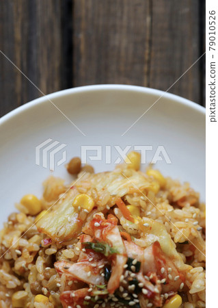 Natto and kimchi fried rice made with pressed barley and rice Natto and kimchi fried rice made with pressed barley and rice 79010526