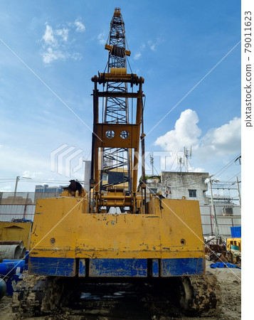 Cranes on the construction site area industry machine of drilling piles Cranes on the construction site area industry machine of drilling piles 79011623