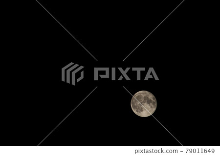 Full moon shining in the night sky, moon age 14.7 79011649
