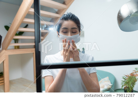 Sick girl wearing a mask Sick girl wearing a mask 79012287