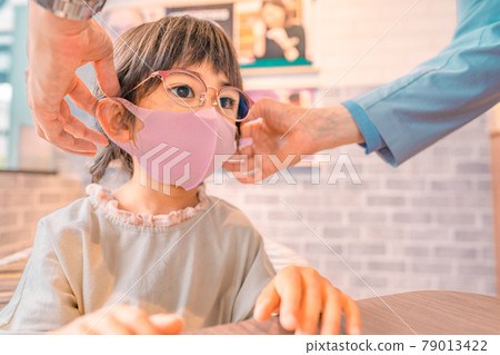 Girl wearing glasses debuts with glasses Girl wearing glasses debuts with glasses 79013422