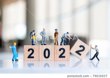 Miniature people : Worker team create wooden block number 2022 Miniature people : Worker team create wooden block number 2022 79016837