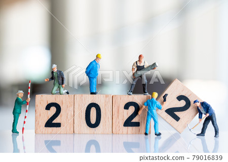 Miniature people : Worker team create wooden block number 2022 Miniature people : Worker team create wooden block number 2022 79016839