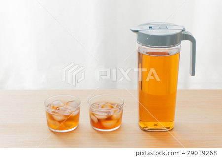 Barley tea and pitcher placed on the windowsill 79019268