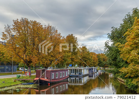channel with barges, Leiden, Netherlands channel with barges, Leiden, Netherlands 79021412