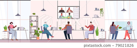 businesspeople in protective masks chatting with colleagues during video call online conference coronavirus pandemic businesspeople in protective masks chatting with colleagues during video call online conference coronavirus pandemic 79021826