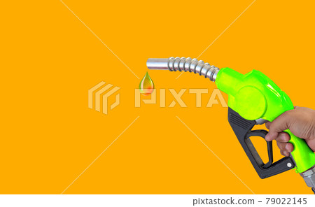 Fuel nozzle Hand holding Oil extracted from the background, clipingpart Fuel nozzle Hand holding Oil extracted from the background, clipingpart 79022145