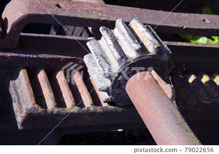 ancient and rusty agriculture gear pinion 79022656