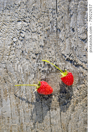 two sweet raspberry on wooden background two sweet raspberry on wooden background 79022657