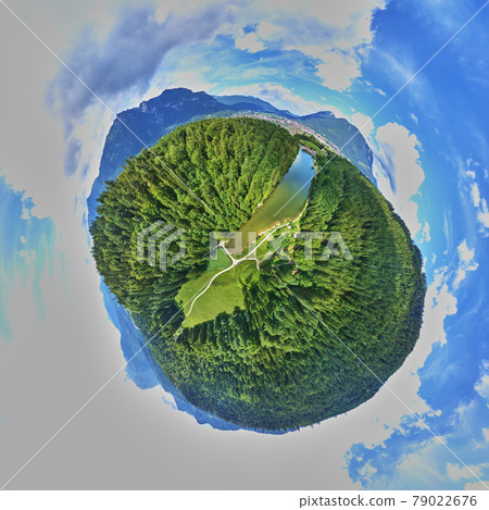 Long stretched narrow lake in Bavaria between woods and meadows in front of a city, Little Planet, Spherical 360 degrees seamless panorama view in Spherical projection 79022676