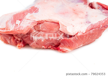 piece of raw pork on a white background. isolated. piece of raw pork on a white background. isolated. 79024353