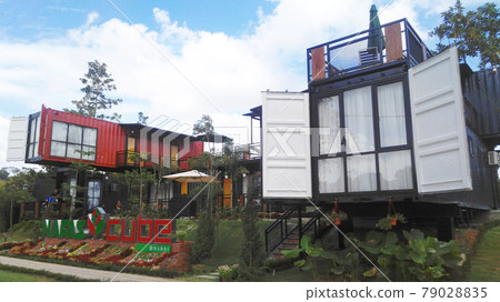 SERDANG, MALAYSIA -DECEMBER 03, 2016: A house designed from refurbish shipping container at Serdang, Malaysia. SERDANG, MALAYSIA -DECEMBER 03, 2016: A house designed from refurbish shipping container at Serdang, Malaysia. 79028835