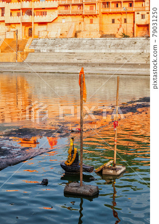 Lingam representation of the Hindu deity Shiva used for worship in Kshipra river, Ujjain, Madhya Pradesh, india Lingam representation of the Hindu deity Shiva used for worship in Kshipra river, Ujjain, Madhya Pradesh, india 79031250