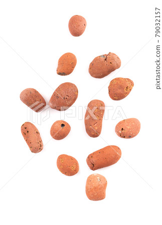 Expanded clay drainage isolated on white background. Whole brown clay pebbles. Top view. 79032157