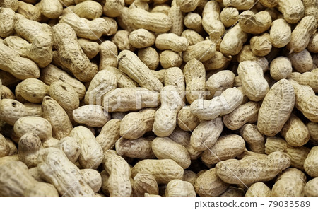 Peanuts are unpeeled. background and texture. agriculture. Peanuts are unpeeled. background and texture. agriculture. 79033589