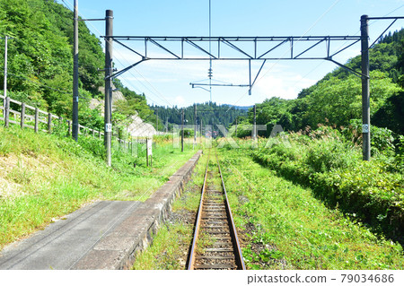 In the summer of 2020, the scenery from the train window from Nozoki Station on the Ou Line to Shinjo Station In the summer of 2020, the scenery from the train window from Nozoki Station on the Ou Line to Shinjo Station 79034686