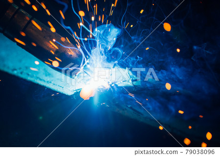 artistic welding sparks light, industrial background artistic welding sparks light, industrial background 79038096