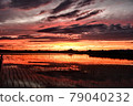 Nostalgic sunset seen on the way home in the countryside 79040232