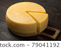 Canestrato cheese on a wooden board 79041192
