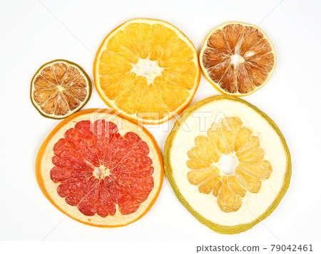 mix of different pieces of dried citrus fruit on white background mix of different pieces of dried citrus fruit on white background 79042461