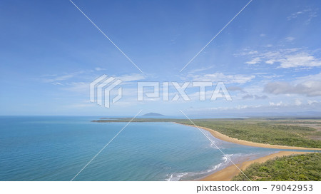 Aerial Over Coastal Shoreline With Calm Ocean 79042953