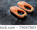Fresh salmon fish fillet on wooden board 79047865