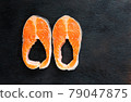 Fresh salmon fish fillet on wooden board 79047875