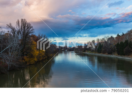Riverside view from Isabella Bridge on the Po River in Turin, Italy at dusk Riverside view from Isabella Bridge on the Po River in Turin, Italy at dusk 79050201
