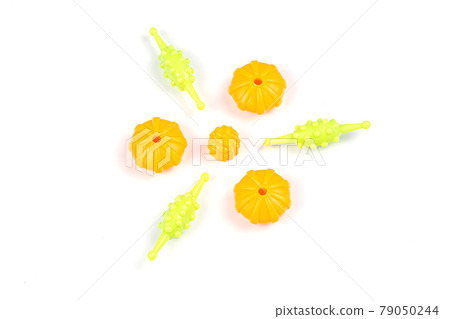 Close-up view of Multicolored plastic beads for a girl's bracelet Close-up view of Multicolored plastic beads for a girl's bracelet 79050244