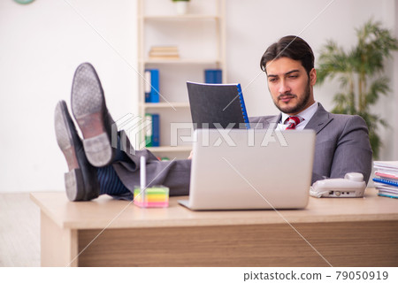 Young businessman employee working in the office Young businessman employee working in the office 79050919