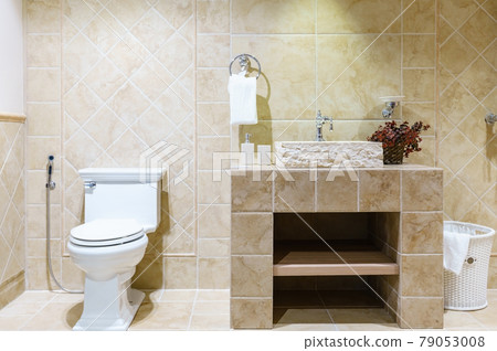 White urinal and washbasin and shower in granite bathroom, Modern house bathroom interior, luxury bathroom 79053008
