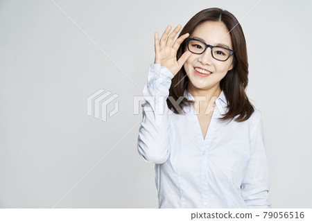 glasses, ophthalmology, young woman, business woman, career woman, nude, gray background 79056516