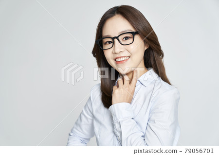 glasses, ophthalmology, young woman, business woman, career woman, nude, gray background 79056701