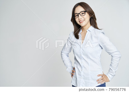glasses, ophthalmology, young woman, business woman, career woman, nude, gray background 79056776